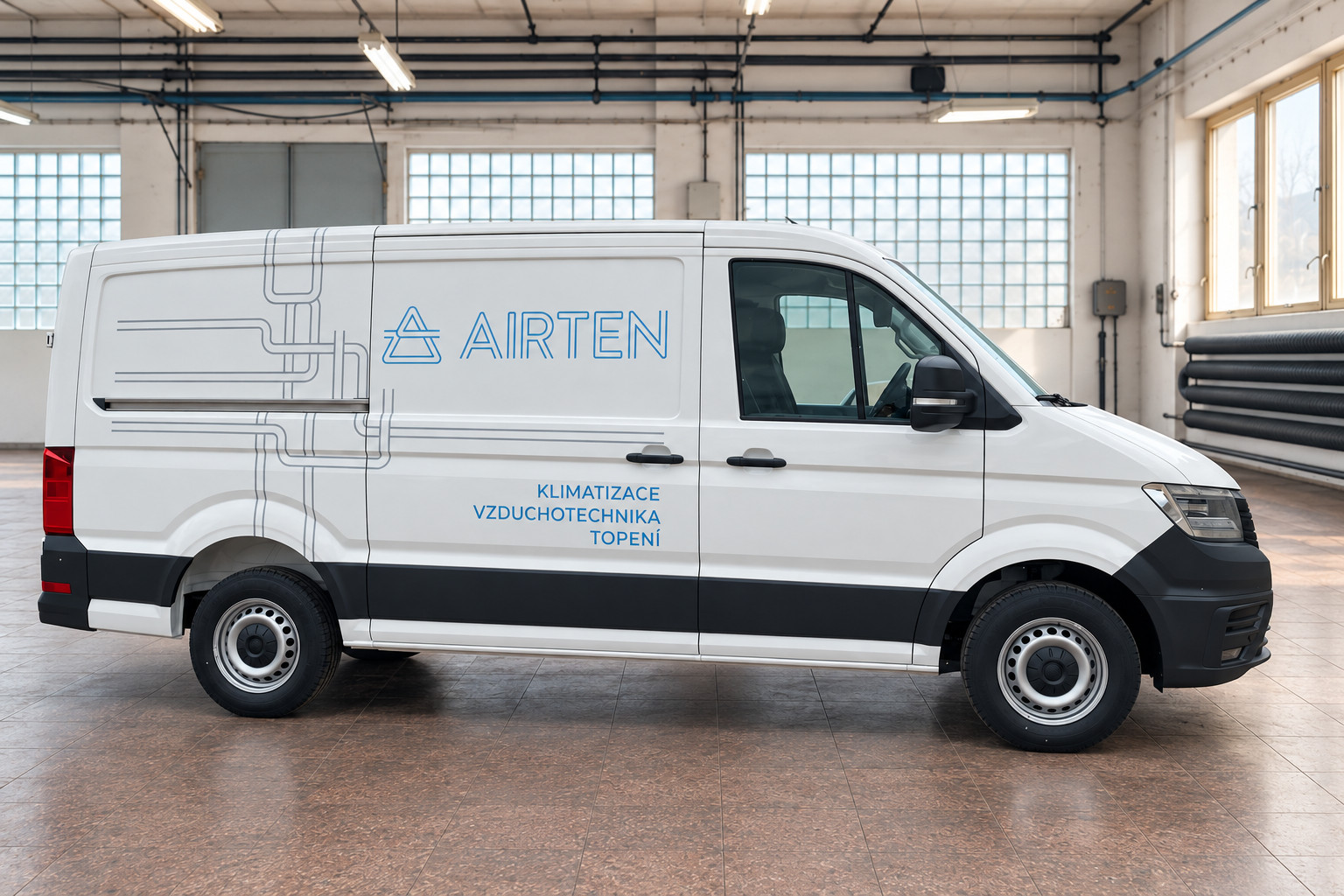 A4FA2AA0-8986-4752-9940-093B3A3D2DF8 side wrap of an AIRTEN van featuring custom pipework graphics