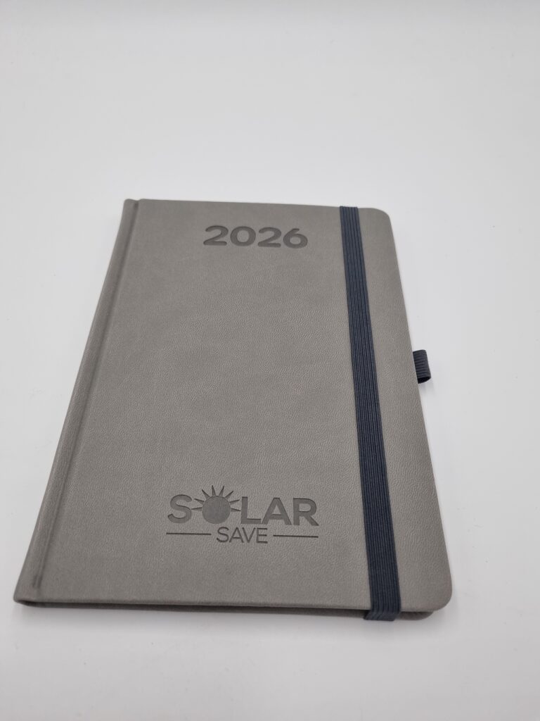 Šedý zápisník se slepotiskem Solar Save